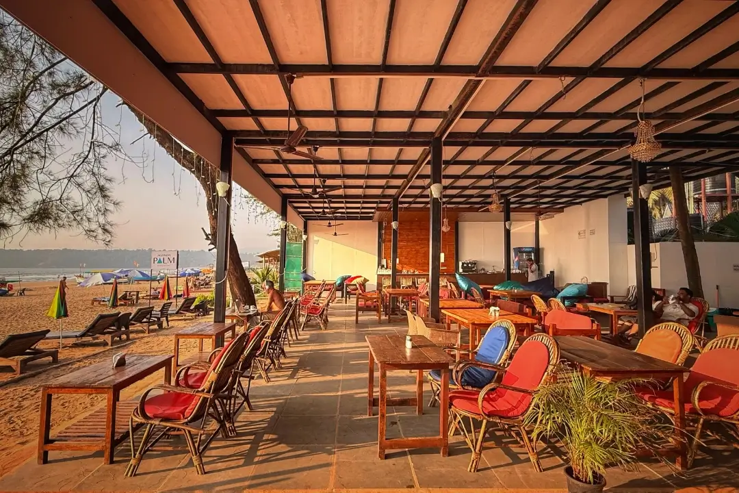 A spacious restaurant featuring numerous chairs and tables arranged for dining.